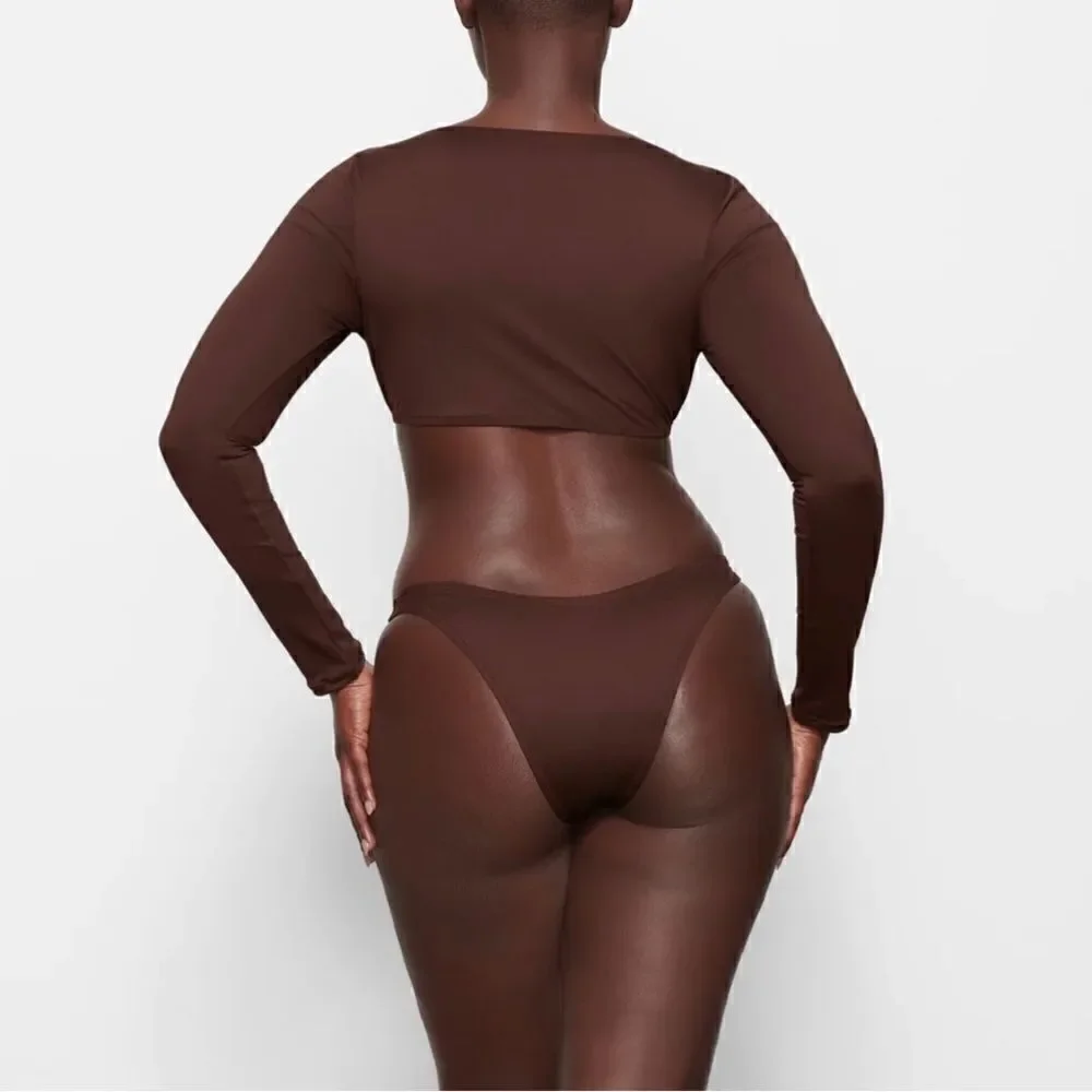 SKIMS SWIM BIKINI bottoms in chocolate brown